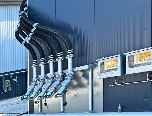 Silo Control System and filling pipes on the outside of a building